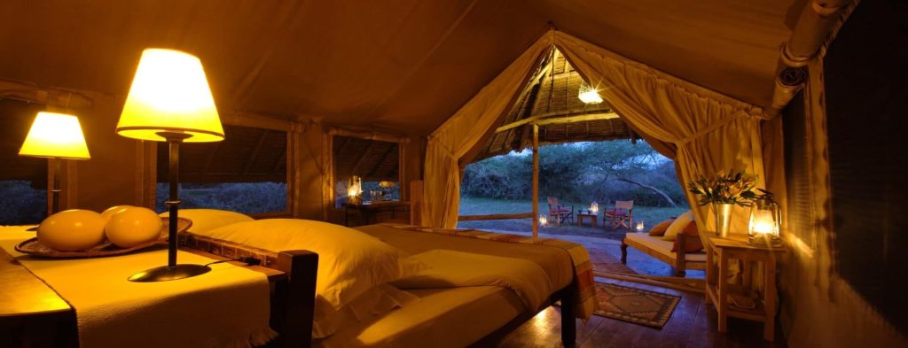 Tortilis Camp - Double Tent at Dusk Szenisch Africa Safaris & Expeditions